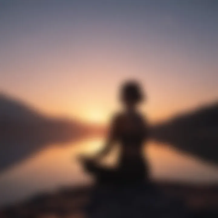 Silhouette of a person meditating at sunset