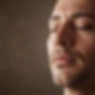 Close-up of a person engaging in mantra meditation with closed eyes