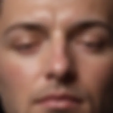 Close-up of a peaceful face in a meditative pose with closed eyes